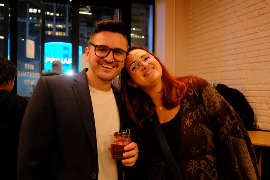 Two attendees posing together
